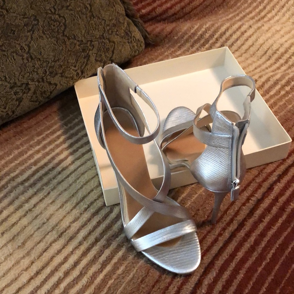 Platinum metallic lizard heels